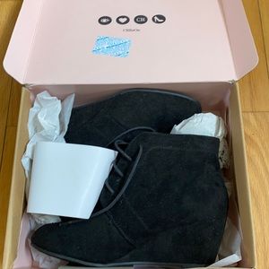 Black sueded lace up wedge heel ankle boots